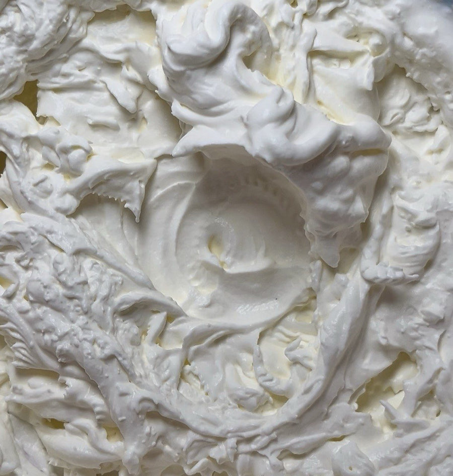 Close-up of hand-sculpted whipped cream